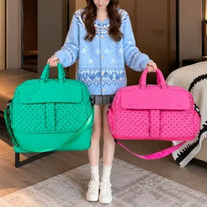 Large capacity travel luggage bag with polka dot pattern, lightweight short trip fitness bag detail