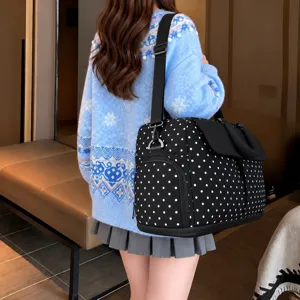 Large capacity polka dot travel duffel bag detail shot, lightweight and expandable for gym.