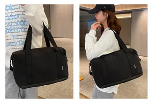 Tragbare schwarze Reisetasche mit großem Fassungsvermögen und leichtem Design für Sport und Alltag.