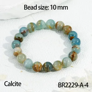Natuurlijke 10mm blauwe calciet edelsteen kralen stretch armband gedetailleerd weergave.