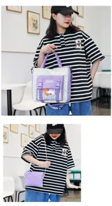 Detailed view of the cute canvas tote bag featuring a transparent front pocket and adorable plush toy.