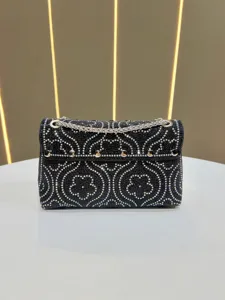 Elegant black rhinestone evening bag with silver chain strap sparkling party shoulder purse.