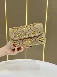 Rhinestone evening clutch bag for women sparkly crystal chain shoulder handbag detail.