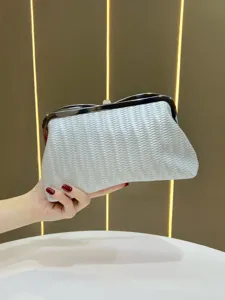 Elegant woven evening clutch bag for women, luxury style ladies handbag for parties.