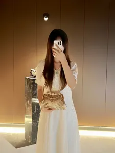 Elegant gold rhinestone evening clutch bag with metallic handle for women party wedding.