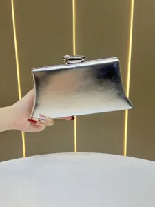 Silver metallic evening clutch bag, elegant minimalist design for women's party and wedding use.