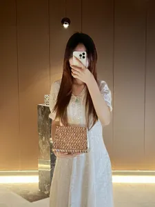 Detailed view of the luxury rhinestone evening clutch, sparkling crystal box bag for events.