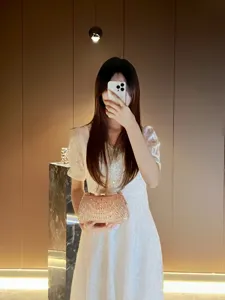 Elegant sparkling rhinestone clutch bag for women, chic evening party handbag with chain.
