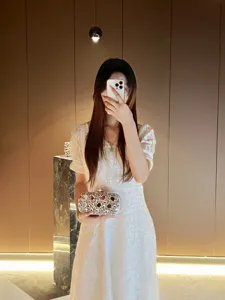 Exquisite crystal evening clutch bag for women, sparkling rhinestone luxury purse for wedding party.