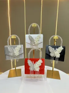 Fashion rhinestone butterfly evening handbag with tassel design, elegant luxury ladies bag.
