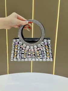 Exquisite rhinestone crystal evening handbag detail, sparkling luxury handbag design close-up.