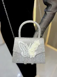 Glänzende Strass Abendtasche mit Schmetterling Motiv, Henkel und Schulterkette für Damen.
