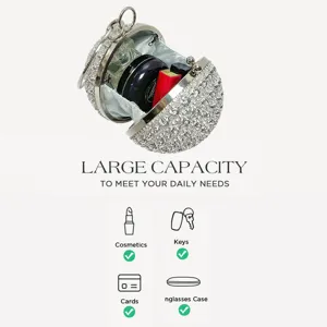 Rhinestone spherical evening bag capacity detail, crystal clutch showing interior space.