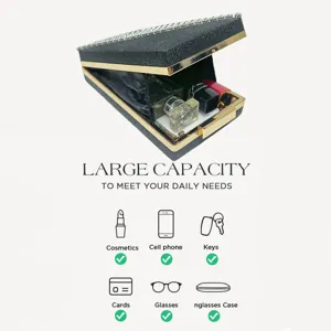 Detail view of the sparkly evening clutch showing large inner capacity for phone, cosmetics and keys.