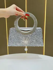 Exquisite rhinestone evening bag with round handle and crystal pendant for women party dress.