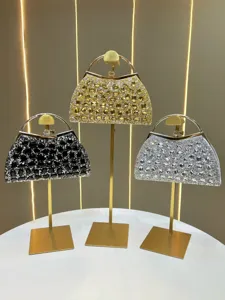 Luxury rhinestone evening clutch bag, elegant crystal metal handle handbag for women parties.
