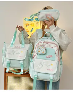 Ensemble de cartable d'etudiant avec un sac a dos et un fourre-tout vert menthe.