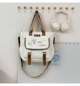 Sac cabas fourre-tout en toile pour femme, sac à bandoulière tendance beige avec poche.