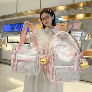 Joli ensemble sac à dos et sac cabas à imprimé floral rose, grande capacité pour étudiantes.