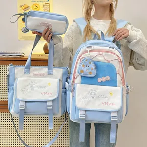 Joli ensemble de cartable multi-pièces pour filles, avec sac à dos, sac cabas et trousse.
