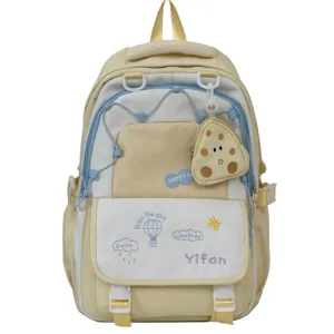 Joli cartable scolaire jaune et blanc pour étudiants avec poche avant, sac à dos vue principale.