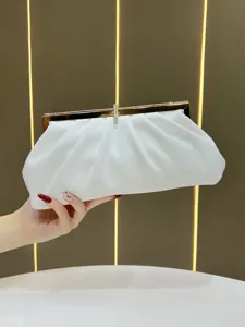 Elegant white ruched evening clutch bag with sparkling rhinestone metal frame detail.