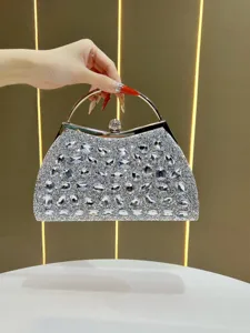 Exquisite rhinestone evening clutch bag detail, sparkling crystal handbag for party and wedding.