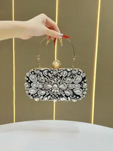 Exquisite crystal rhinestone evening clutch bag detail, sparkling diamond bridal purse.