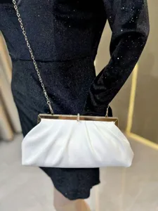 Elegant white pleated evening clutch bag with metal frame and chain strap for women.