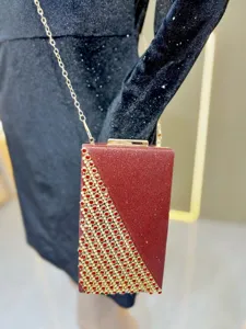 Red crystal evening clutch bag detail, glitter small square crossbody bag with gold chain.