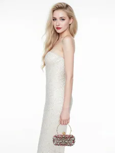 Exquisite rhinestone evening clutch detail featuring brilliant crystal embellishments and gold.