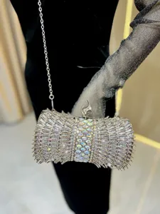 Sparkly rhinestone evening clutch bag detail showing glamorous crystal encrusted design.