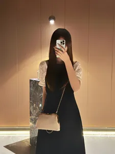 Elegant evening clutch bag with chain strap, sophisticated design for women's parties and daily use.