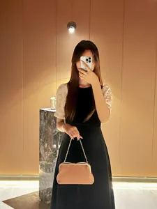 Elegant women evening clutch bag with chain strap fashion versatile crossbody handbag detail shot