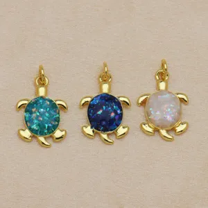Gold-tone turtle pendant with colorful opal insert, charming necklace DIY jewelry accessory.