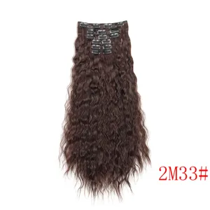 Detail view of brown wavy clip-in hair extension piece with secure clips for easy daily styling.