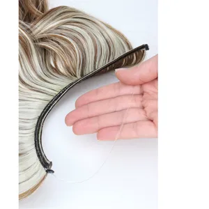 Extension de cheveux halo invisible fil synthétique ondulé couleur blond marron détail