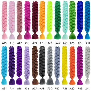 Detailed view of colorful jumbo braid synthetic hair extensions, vibrant hues and neat display.