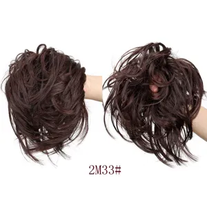 Synthetic messy hair bun extension detail view, fluffy curly hair scrunchie for women styling.