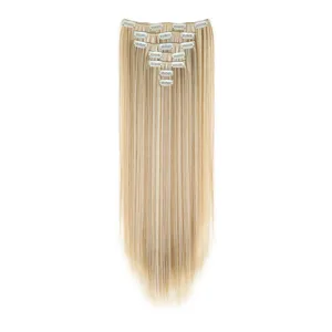 Long straight blonde hair extension detail showing metal clips and smooth synthetic fiber strands.