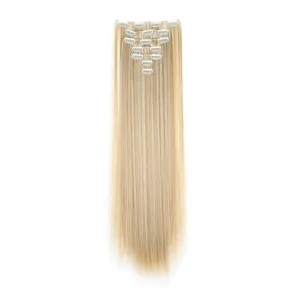 Detail view of blonde straight hair extensions, 7-piece 16-clip set for volume and length.