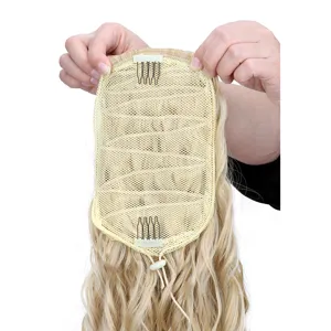 Detail view of blonde curly ponytail extension showing inner mesh cap and secure comb clips.