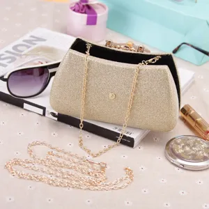 Gold glitter evening clutch bag for women, elegant diamond chain crossbody bag for party events.