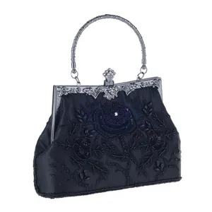 Vintage black beaded evening bag with exquisite floral embroidery and metal handle detail.