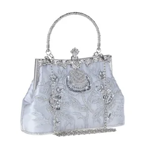 Vintage beaded evening bag with floral embroidery, elegant silver clutch for women.