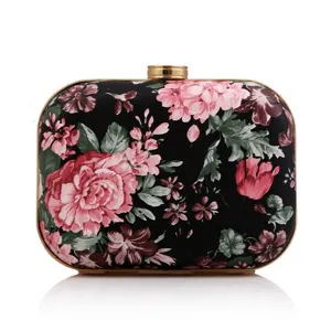 Floral print hard case clutch bag for women, elegant evening party purse with gold tone frame.