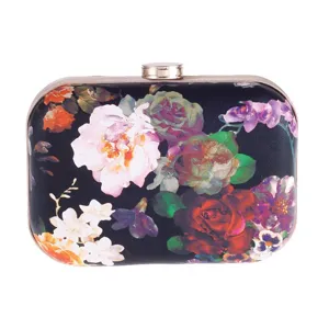Exquisite floral print detail on the elegant hard-shell evening clutch bag surface.