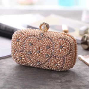 Pearl beaded evening clutch bag with sparkling rhinestones, elegant heart floral design for parties.