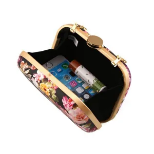 Floral print hard shell clutch bag for women, elegant evening party purse with metal frame.