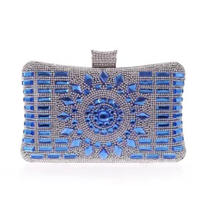 Blue crystal evening clutch bag detail, sparkling rhinestone rigid box handbag for women.